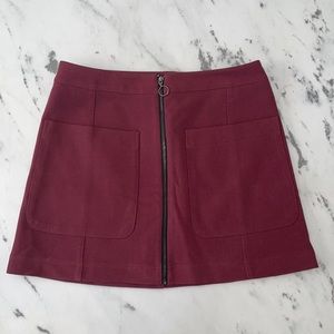 Mini Rachel Rachel Roy skirt with 2 front pockets and zipper